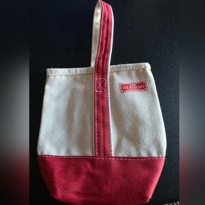 This is a new, unused Lee Kum Kee sauce bag holder, promotional item
